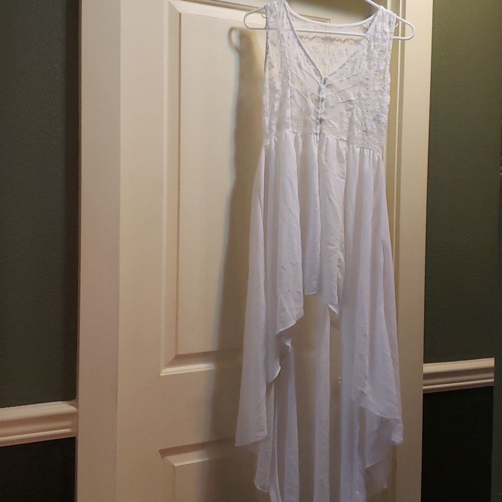 Lyrical sheer high low dance dress.